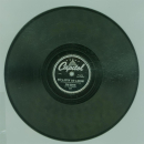Stan Kenton and his Orchestra - Just a-sittin and...