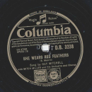 Guy Mitchell - She wears red feathers / Why should I go home